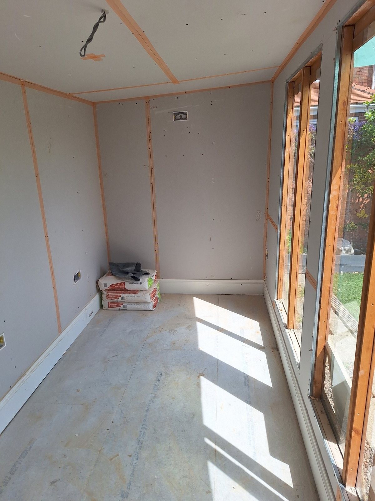 Summerhouse assembly and fit-out — Pre-skim plasterboard